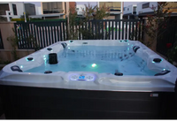 Vitvitt spabad PassionSpa Desire Signature med svarta accenter och blå LED-belysning