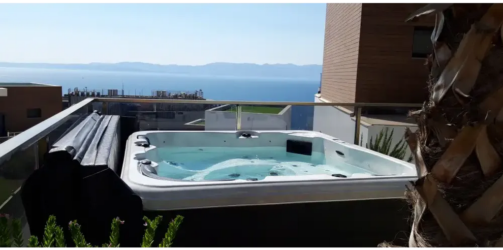 Vit PassionSpa Relax Spabad Pure Collection, vit rektangulär med blåvatten och svarta paneler