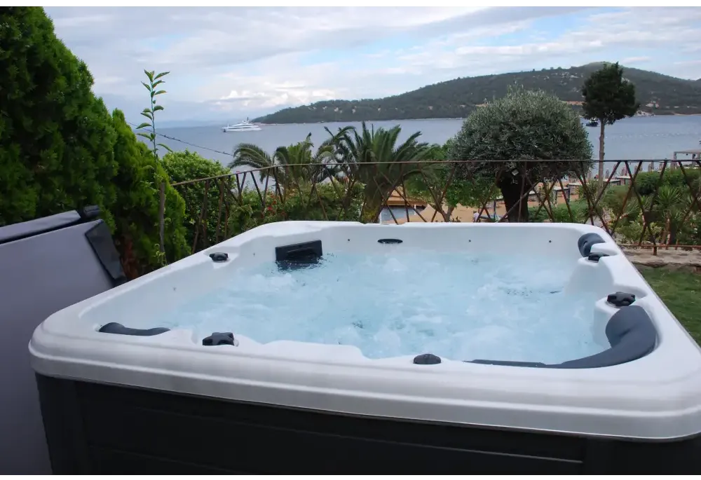 Vit PassionSpa Relax Spabad Pure Collection, svartvit bubblande spabad med modern design