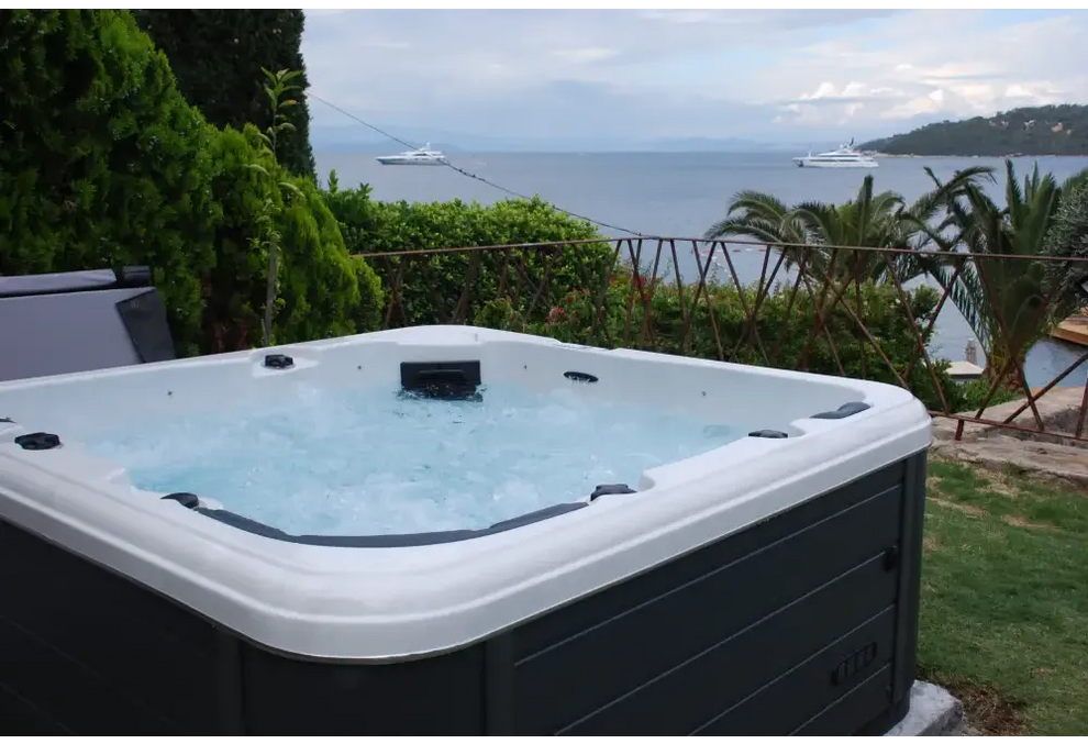 Svartvit PassionSpa Relax Spabad Pure Collection med bubblande vatten