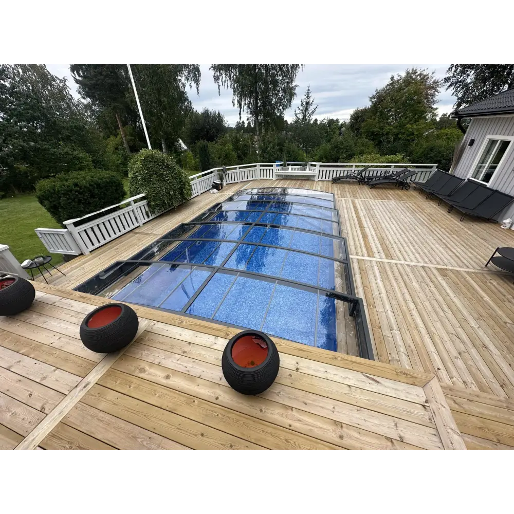 Elegant pooltak Sydney med enkelskena antracit, transparent glastak med blå textur