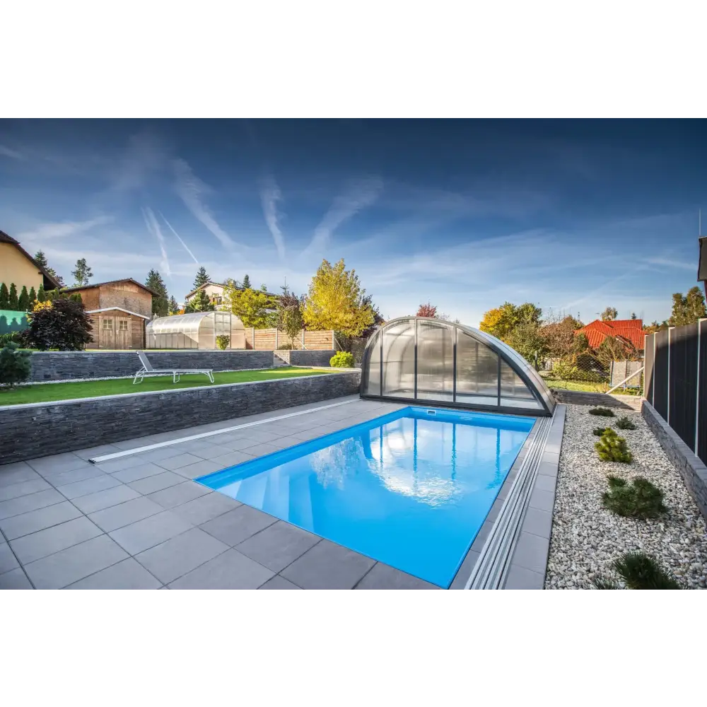 Blå rektangulär pool ThermoPP Poolpaket QBig med transparent valv och grå stenplattor