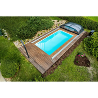 Rektangulär ThermoPP Poolpaket QBig med klarblått vatten under glas