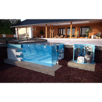 Blåvit underjordisk poolfiltreringssystem med synliga komponenter i ThermoPP Poolpaket QBig Overflow 3×6